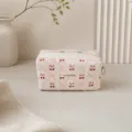 Detailed view of the sweet lace makeup pouch featuring a cute cherry and bow print fabric. - Pink Cherry Bowknot Medium Pencil Case