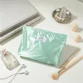 Borsa cosmetica impermeabile lucida, elegante custodia portatile per il trucco da viaggio. - Verde
