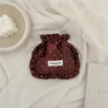 Ruffled satin polka dot drawstring pouch detail, elegant jewelry storage bag lifestyle shot. - 15.5*17cm / Brown