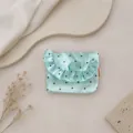 Mint green satin coin purse detail showing cute polka dot print and delicate ruffle flap design. - Satin Polka Dot / 12*9cm / Green