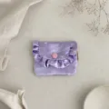 Close-up detail of the purple satin ruffle coin purse with cute bow print and pink button. - Satin Bow / 12*9cm / Purple