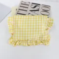 Yellow and white checkered cosmetic bag detail showcasing ruffled edge and fabric texture. - 22*17 / Big Yellow Grid