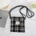 Classic black and white plaid mini crossbody bag close-up, soft woolen fabric with shoulder strap. - 17*20cm / Black and White Plaid