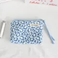 Blue leopard print zipper coin purse with wrist strap and brand tag, compact daily storage pouch. - 16x11x2cm / Blue