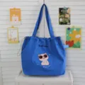 Bolso tote de lona azul con bordado de cerdo lindo, bolso de hombro con cordón para uso diario. - Azul Zafiro