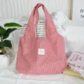 Red and white gingham tote bag detail view showing soft fabric texture and cute woven label. - 43*9*52cm / Red White Plaid