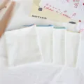 Detail shot of blank canvas pencil pouches with colorful zippers, perfect for DIY and custom logo. - Vertical Pouch / 16*17cm (Purple Zipper)