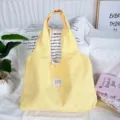 Yellow gingham tote bag detail showcasing soft fabric texture and casual daily commute style. - 43*9*52cm / Yellow Plaid
