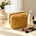 Solid color corduroy makeup bag with large capacity, portable travel cosmetic organizer pouch. - 18x9x13cm / Turmeric