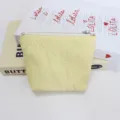 Yellow quilted bow makeup pouch detail, cute cosmetic bag zipper storage zipper pocket. - Yellow Bow Embossed