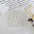 White daisy embroidered mesh drawstring bag for jewelry and cosmetic storage gift packaging. - Mesh Embroidered Daisy
