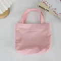 Pink mini nylon tote bag detail showing fabric texture and double handles in minimalist style. - 21*6*27cm / Peach Pink