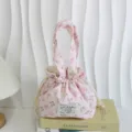 Detalle de bolso de mano de pana floral rosa, diseño lindo, bolsa de almacenamiento. - Pequeña Flor de Cuadros Rosas