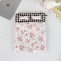 Detailed view of the cute bed-shaped quilted laptop sleeve, soft anti-shock pouch. - Pink Floral