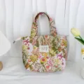 Vintage floral jacquard bento bag detail shot, showing textured canvas fabric and label. - Abundant Flowers