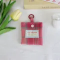 Roze geruite mini portemonnee koptelefoon tas met ophangring en geborduurd label. - Roze Geruit