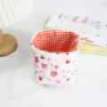 Détail de panier de rangement en tissu, organisateur de bureau avec doublure. - Lapin Rose