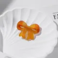 Elegante Acetat Schleife Haarklammer für Damen, stilvolles caramel Haaraccessoire Entenschnabel. - Schokoladenbraun