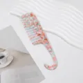Wide-tooth curved handle hair comb with stylish colorful marbled pattern for daily styling and detangling. - Floral Pink