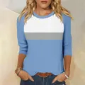 Detailed shot of the stylish color-block 3/4 sleeve women t-shirt with classic round neck. - White and Royal Blue