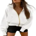 Detailed view of the women's white zip-up hoodie featuring long sleeves and cropped fit. - S / Tops / White