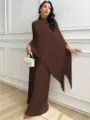 Detail view of elegant brown pleated loose asymmetrical two-piece outfit setting. - Brown