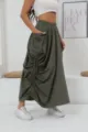 Detail view of dark green cargo maxi skirt featuring adjustable side ruching and pockets. - S / Army Green