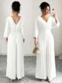 Elegant white V-neck pleated long sleeve jumpsuit with cinched waist and wide leg design. - White Long Sleeve