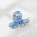 Molla per capelli in acetato blu e bianco con design a fiocco per acconciature eleganti. - modello base / Blu