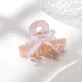 Pinza de pelo de acetato rosa con lindo lazo para mujeres accesorio de peluqueria diario. - Estilo Lazo / Arcoíris