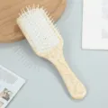 Stylish aesthetic air cushion hair brush with chic acetate pattern handle for daily scalp massage. - White