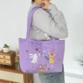 Purple quilted tote bag with cute cartoon rabbit embroidery, soft large capacity shoulder bag. - Quilted Heart Three Rabbits / Purple