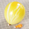 Decorative yellow and white marbled latex balloon for birthday party and wedding event - Yellow Agate Style