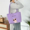 Light purple quilted tote bag with heart pattern and cute cartoon pig embroidery for daily use. - Quilted Heart Sunglasses Pig / Purple