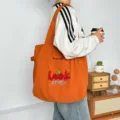 Bolso tote de lona naranja con bonito bordado de cerezas, cordón y gran capacidad. - Look Cereza Naranja