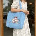 Bolso tote de lona con cerdito bordado lindo, bolso de hombro informal para mujeres. - Azul