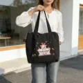 Bolso tote de lona negra con bordado de cerdito tierno, bolso de hombro casual para uso diario. - Negro