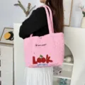 Pink quilted heart tote bag detail, featuring cute cherry embroidery and durable straps. - Quilted Heart Cherry Look / Pink