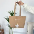 Khaki gewatteerde tas met schattige eendenborduurwerk en hartjespatroon voor dagelijks gebruik. - Bruin (Gelukkige Eend)