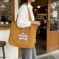 Bolso de lona casual para mujer bonita bolsa de hombro bordada de dibujos animados gran capacidad - Amarillo jengibre