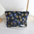 Pochette cosmetica vintage con stampa floreale goffrata e chiusura lampo, elegante borsa da viaggio. - Borsa Rétro Piccoli Fiori