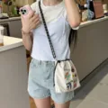 Canvas mobile phone bag with cute floral embroidery, casual crossbody bag for women daily commute. - Gray