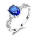 S925 Sterlingsilber Ring mit ovalem blauen Kristall und funkelnden Zirkonia Steinen. - Größe 5 / Dunkelblau