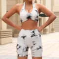 Detailed view of the seamless tie-dye yoga set featuring a chic halter crop top and shorts. - S / Top And Bottom / White