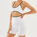 Close-up detail of the contrast trim sports bra and high-waist fitness shorts set. - S / Top And Bottom / White