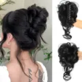 Synthetic messy hair bun claw clip hair extension detail view showing natural wavy texture black hair - Natural Black