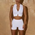 Women ribbed athletic two-piece workout set, front zip crop top and matching shorts. - S / Top And Bottom / White