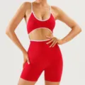Details of the red and white contrasting sports yoga set showing backless cutout design. - China Red