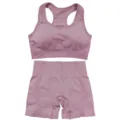 Seamless 2-piece workout set featuring a racerback sports bra and high-waisted shorts. - S / Pink