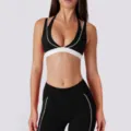 Zwarte en witte contrasterende halter sport-bh en fitness leggings set voor dames. - S / Boven- en onderkant / Premium Zwart